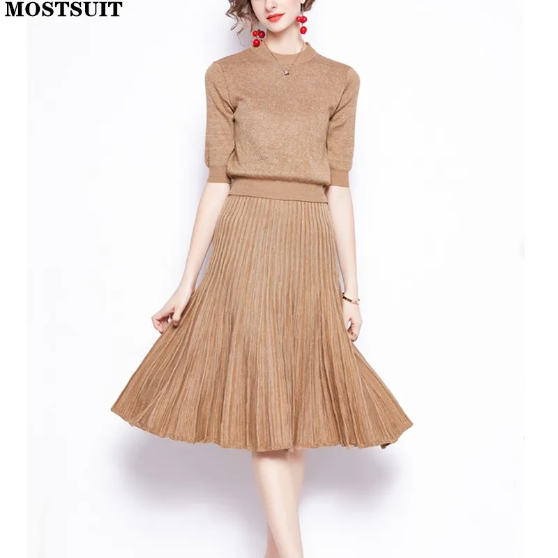 Elegant Shiny Knitted Two Piece Skirt Set Women 2022 Spring Short Sleeve Tops & High Waist Pleated Skirt Fashion Chic Ladies Set
Elegant Shiny Knitted Two Piece Skirt Set Women 2022 Spring Short Sleeve Tops & High Waist Pleated Skirt Fashion Chic Ladies Set