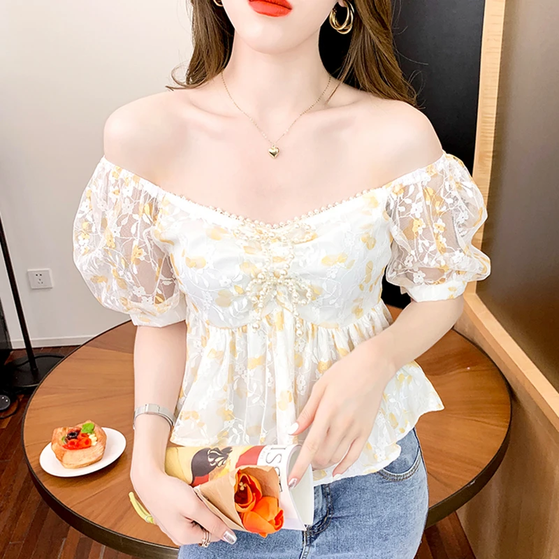 Women Sweet Shirt 2021 New Elegant Short Sleeve Lace Floral Blouse Ladies Waist Thin Chic Beading Casual Short Top Temperament
Women Sweet Shirt 2021 New Elegant Short Sleeve Lace Floral Blouse Ladies Waist Thin Chic Beading Casual Short Top Temperament