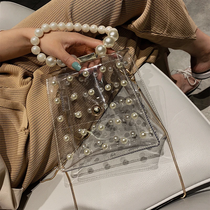 New Fashion PVC Jelly Transparent Bag with Pearl Lady Handbag Mini Chain Flap Cute Messenger Bag Bolsa Feminina Clear Bag
New Fashion PVC Jelly Transparent Bag with Pearl Lady Handbag Mini Chain Flap Cute Messenger Bag Bolsa Feminina Clear Bag