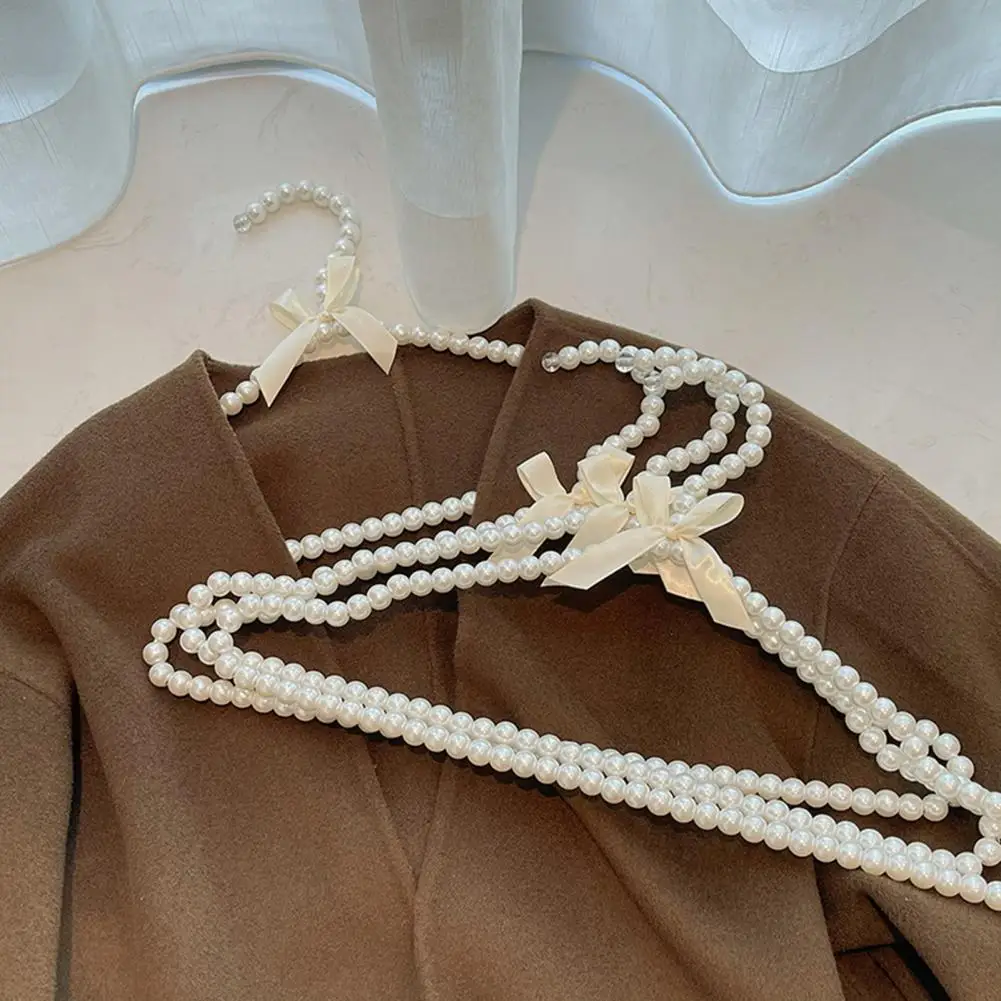 2Pcs Portable Beads Clothes Hanger with Bow Knot Anti-deformed Clothes Hanger Hanging Shirts Clothes Hanger
2Pcs Portable Beads Clothes Hanger with Bow Knot Anti-deformed Clothes Hanger Hanging Shirts Clothes Hanger