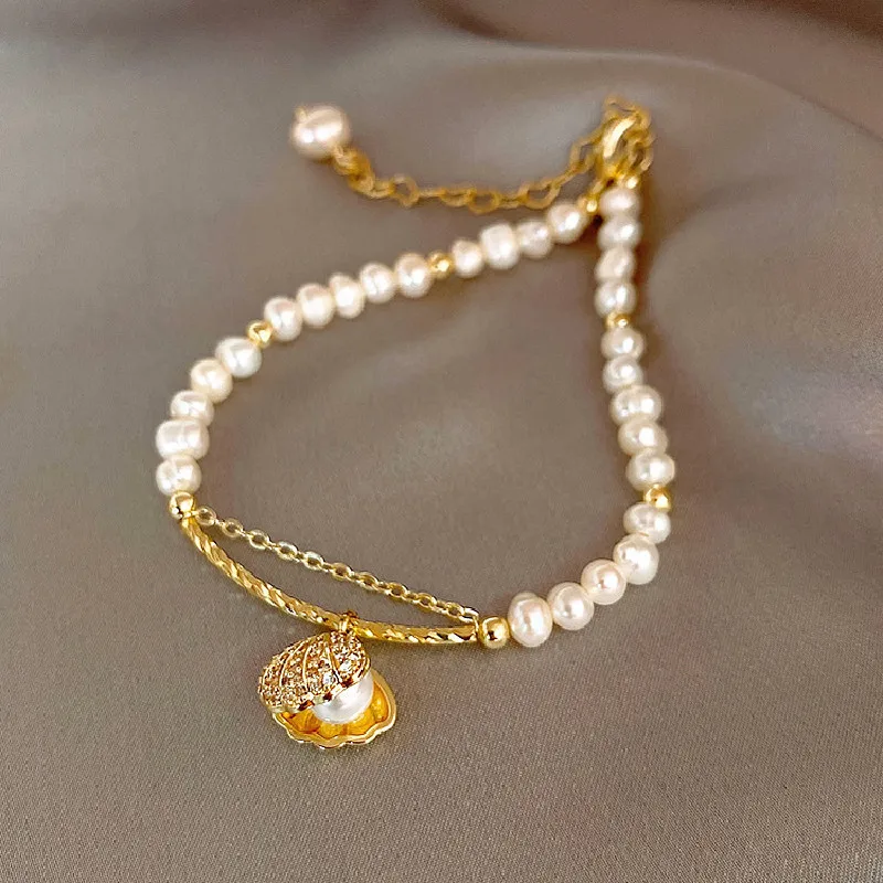 New Natural Baroque Pearl Bracelet Female Ins Tide Niche Design Sense Girlfriends Sisters Simple Shell Jewelry 
New Natural Baroque Pearl Bracelet Female Ins Tide Niche Design Sense Girlfriends Sisters Simple Shell Jewelry