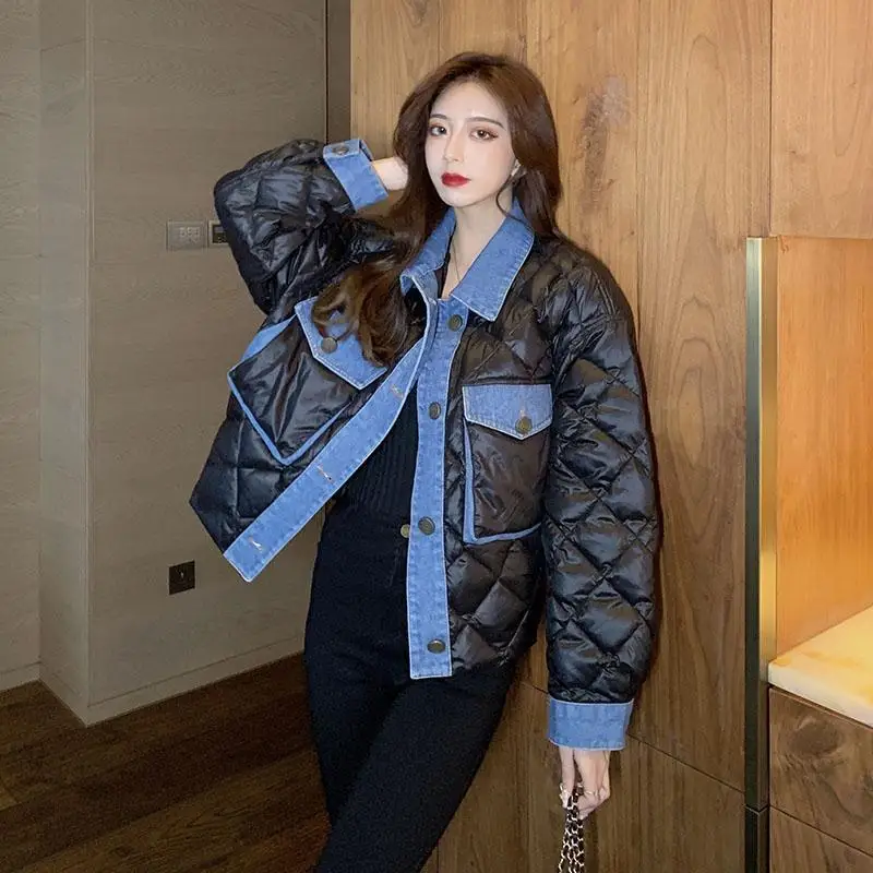 Cotton clothes women's design sense niche 2021 winter new Korean loose short denim splicing black cotton coat coat
Cotton clothes women's design sense niche 2021 winter new Korean loose short denim splicing black cotton coat coat