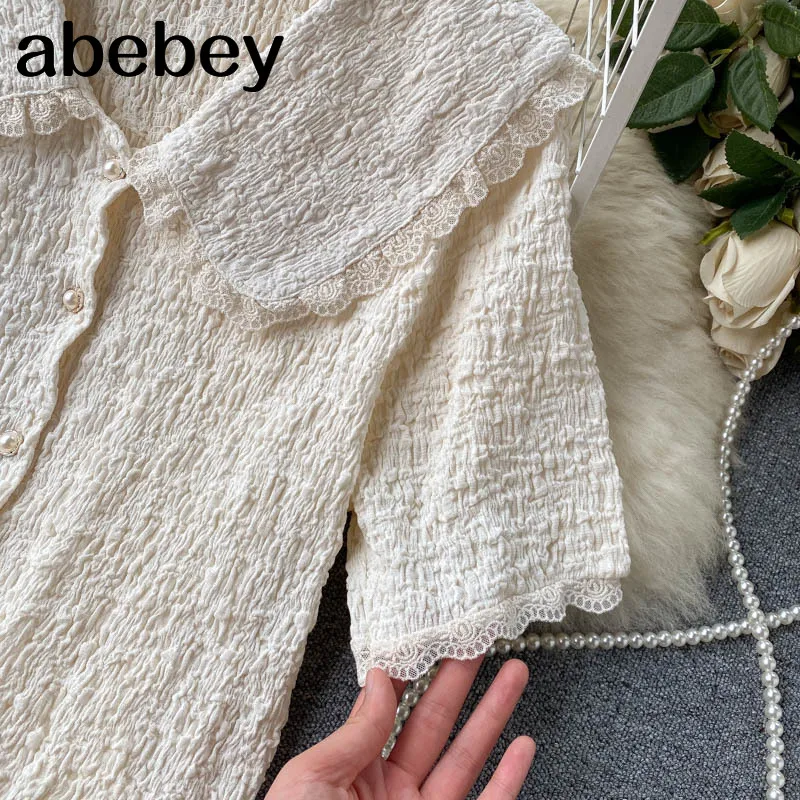 Women Elegant Solid Blouse Spring Retro Peter pan Collar Puff Sleeve lace Tops Korean Chic Ruched Streetwear Short Blouse
Women Elegant Solid Blouse Spring Retro Peter pan Collar Puff Sleeve lace Tops Korean Chic Ruched Streetwear Short Blouse