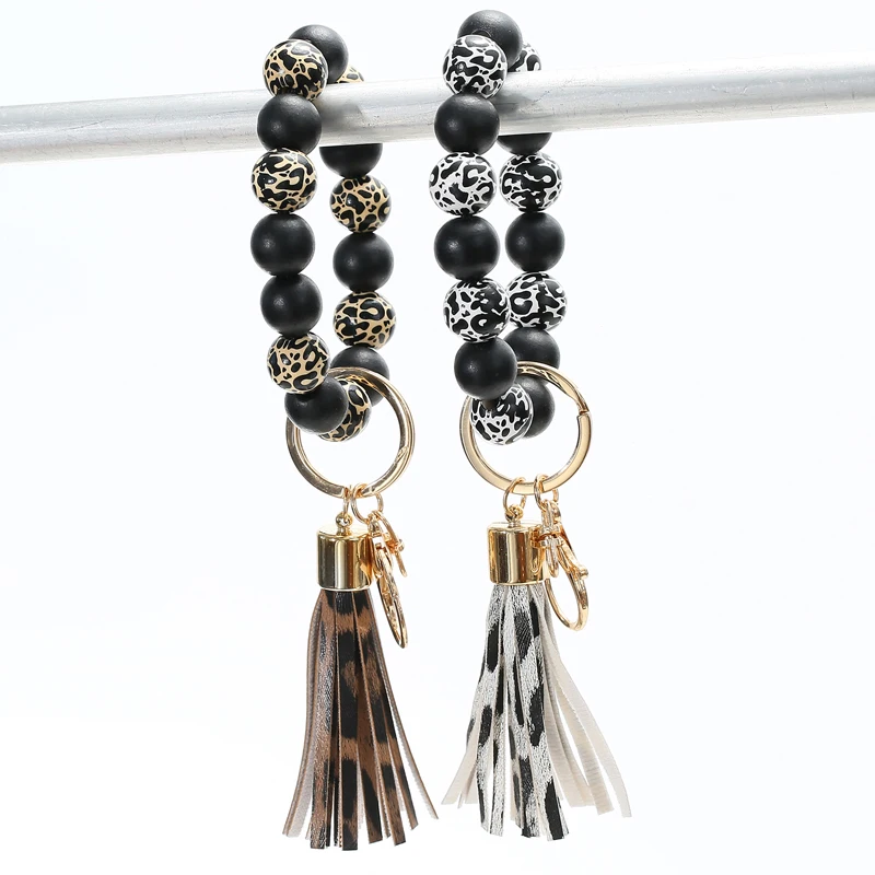 PU Leather Tassel Keychain For Women Wood Beads Bracelet Keychain Keyring Fashion Jewelry Accessories
PU Leather Tassel Keychain For Women Wood Beads Bracelet Keychain Keyring Fashion Jewelry Accessories