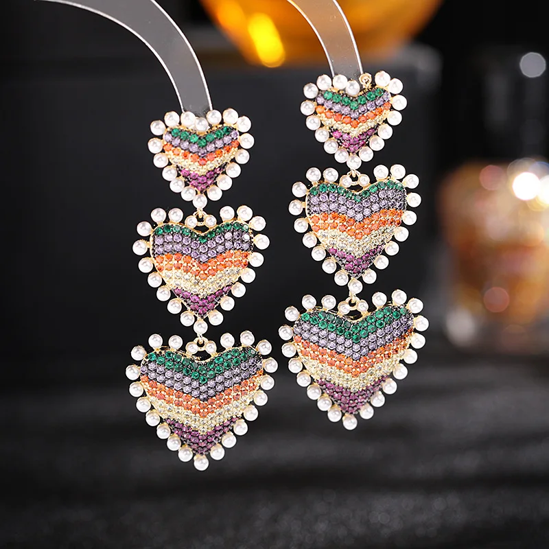 Женские серьги-подвески в форме сердца с цирконием
Женские серьги-подвески в форме сердца с цирконием