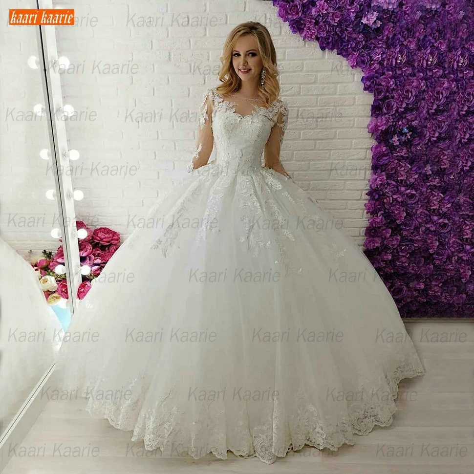 Sexy Long Sleeves Wedding Gowns 2021 Beaded Abiti Da Sposa Lace Up Appliqus Gown Bridal Dresses Women Tulle Ball Robe De Mariage 
Sexy Long Sleeves Wedding Gowns 2021 Beaded Abiti Da Sposa Lace Up Appliqus Gown Bridal Dresses Women Tulle Ball Robe De Mariage