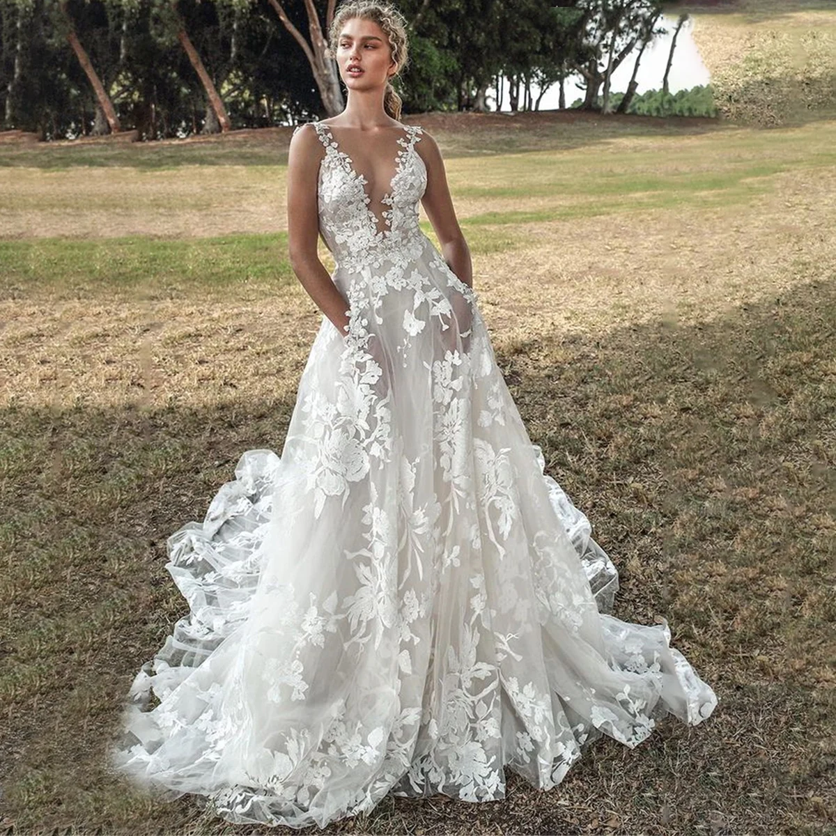 Rustic Wedding Dress with Pockets Deep V-Neck Custom Made Plus Size Appliqued Long Tulle Romantic Bridal Gown Custom Made 
Rustic Wedding Dress with Pockets Deep V-Neck Custom Made Plus Size Appliqued Long Tulle Romantic Bridal Gown Custom Made
