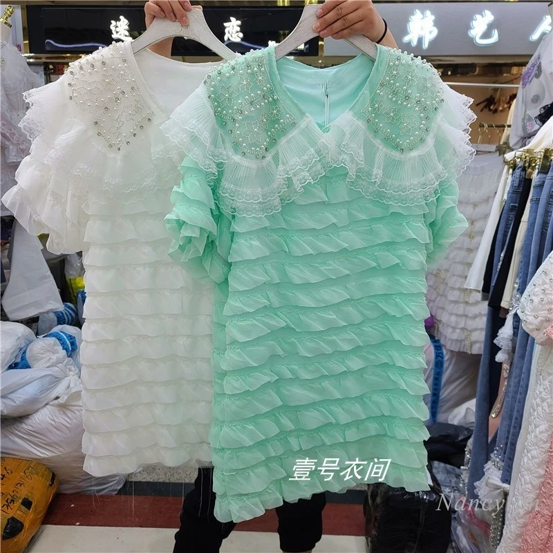 Women Summer Shirt 2021 New Heavy Industry Beads Diamond Ruffled Doll Collar Multi-Layer Cake Top Girls Lady Blouses Blusas
Women Summer Shirt 2021 New Heavy Industry Beads Diamond Ruffled Doll Collar Multi-Layer Cake Top Girls Lady Blouses Blusas