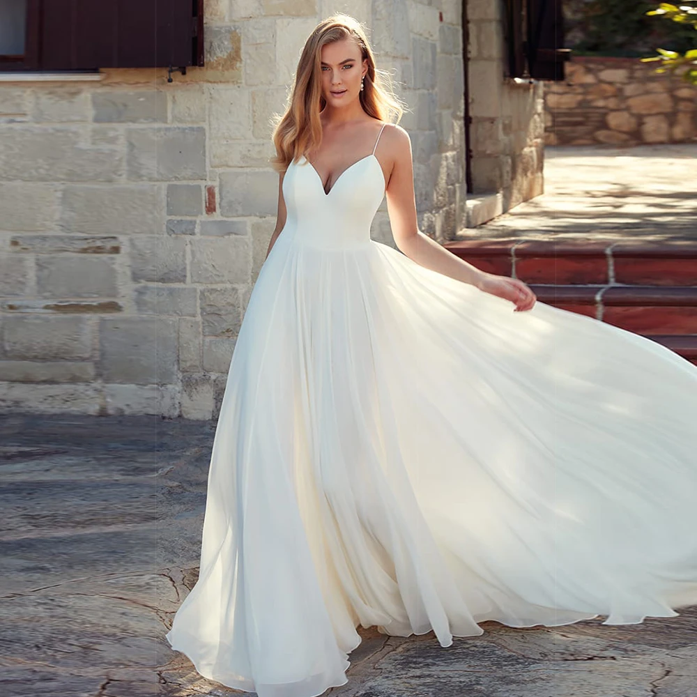 Charming A-Line Chiffon Spaghetti Straps V-Neck Wedding Dress Bridal Gowns with Backless Sweep Train 2021
Charming A-Line Chiffon Spaghetti Straps V-Neck Wedding Dress Bridal Gowns with Backless Sweep Train 2021