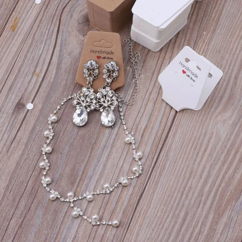 100Pcs Handmade Kraft Paper Blank Tags Display Hanging Cards Package for Ear Studs Earrings Necklaces Jewelry Package
100Pcs Handmade Kraft Paper Blank Tags Display Hanging Cards Package for Ear Studs Earrings Necklaces Jewelry Package