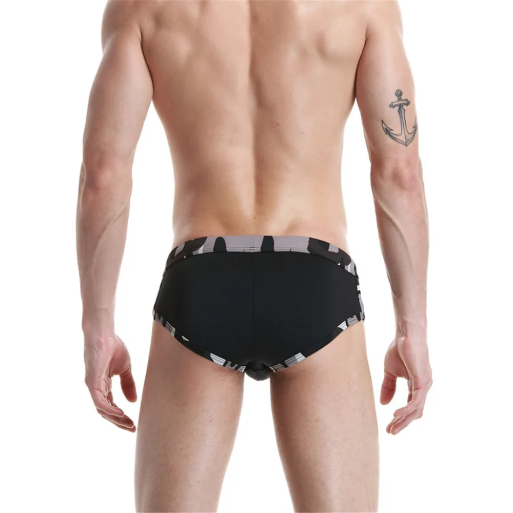 2019 summer new men's tie with low waist hit color camouflage nylon breathable triangle swim trunks men's swimwear 9.16
2019 summer new men's tie with low waist hit color camouflage nylon breathable triangle swim trunks men's swimwear 9.16