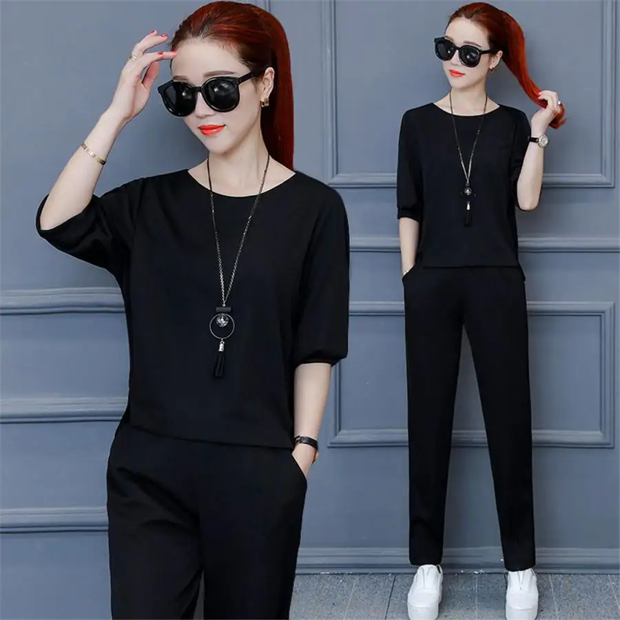 2020 summer Woman tops +wild leg pant Two Sets Knitted Sweater Set 
2020 summer Woman tops +wild leg pant Two Sets Knitted Sweater Set