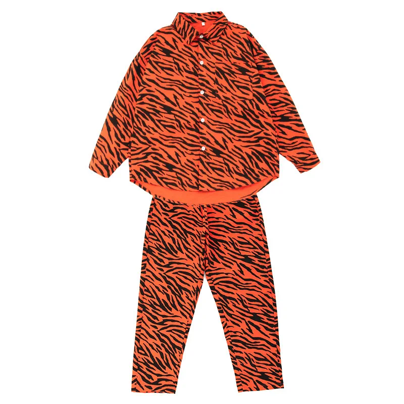 Hip hop boy's fashion, big shirt, zebra printed street clothes, girl's pants, jazz dance clothes
Hip hop boy's fashion, big shirt, zebra printed street clothes, girl's pants, jazz dance clothes