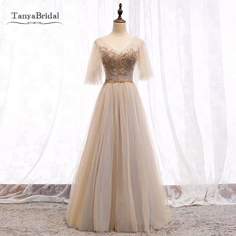 Simple Champagne Long Prom Dresses Half Sleeves Lace Appliques Beads V Back Formal Evening Gown JQ782
Simple Champagne Long Prom Dresses Half Sleeves Lace Appliques Beads V Back Formal Evening Gown JQ782