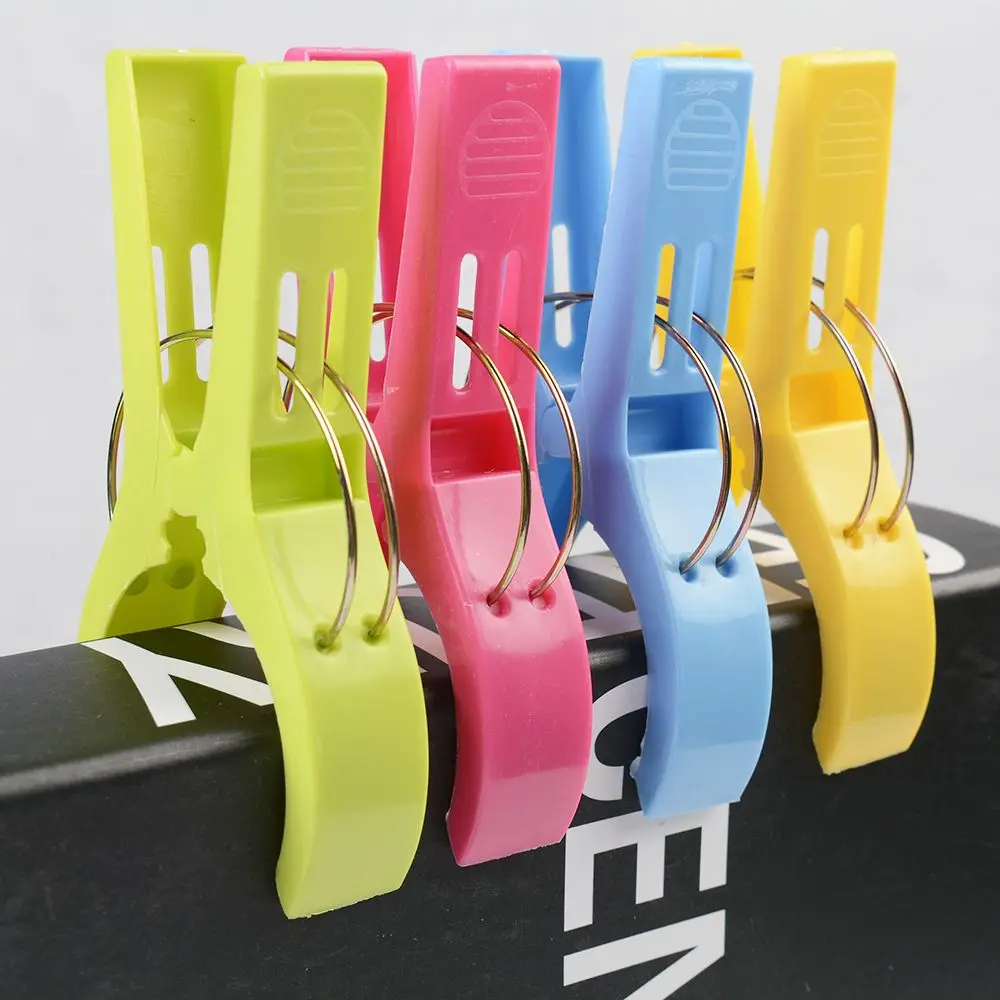 4pcs /set Abs Beach Towel Clips Large Plastic Windproof Clothes Hanging Peg Quilt Clamp Holder For Beach Chair Clothes Pins 
4pcs /set Abs Beach Towel Clips Large Plastic Windproof Clothes Hanging Peg Quilt Clamp Holder For Beach Chair Clothes Pins