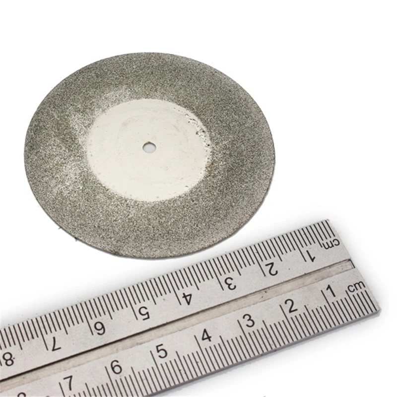 60mm Diamond Grinding Wheel Metal Cutting Disc For Dremel Rotary Tool Saw Blade Cutter Tool With 1 Arbor Shaft 
60mm Diamond Grinding Wheel Metal Cutting Disc For Dremel Rotary Tool Saw Blade Cutter Tool With 1 Arbor Shaft