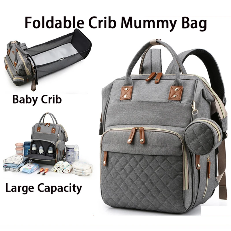 2021 New Korean Fashion Mommy Shoulder Bag Can Hang Stroller Mother And Baby Bag Folding Crib Mommy Bag
2021 New Korean Fashion Mommy Shoulder Bag Can Hang Stroller Mother And Baby Bag Folding Crib Mommy Bag