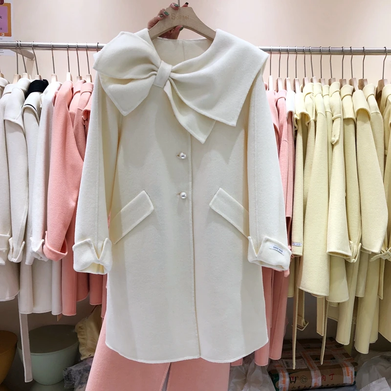 Temperament white bowknot wool blends coat women autumn and winter 2021 mid-length loose outwear
Temperament white bowknot wool blends coat women autumn and winter 2021 mid-length loose outwear