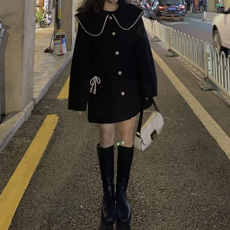 Cotton woolen coat spring and winter cute pearl bow tie doll collar mid-length cloak woolen coat student girl trench
Cotton woolen coat spring and winter cute pearl bow tie doll collar mid-length cloak woolen coat student girl trench