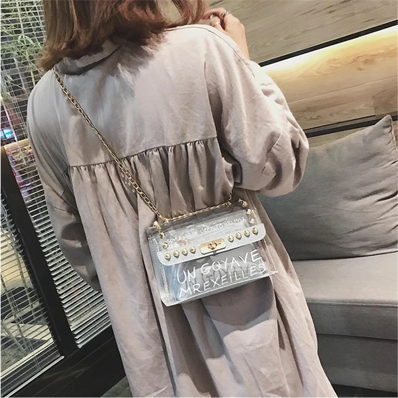 Mini Transparent Square Bag Metal Chain Rivet Shoulder Bags For Women Crossbody Sacs A Bandouliere Bolso Mujer Sacos De Ombro
Mini Transparent Square Bag Metal Chain Rivet Shoulder Bags For Women Crossbody Sacs A Bandouliere Bolso Mujer Sacos De Ombro