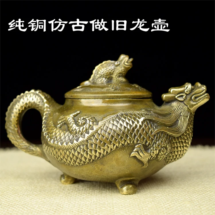 copper The pot body leading dragon old antique dragon pot wind cast brass pot kettle decoration 
copper The pot body leading dragon old antique dragon pot wind cast brass pot kettle decoration