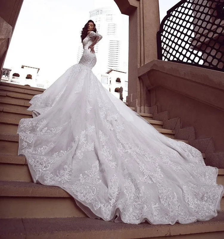 Gorgeous Mermaid Lace Wedding Dresses Sheer Plunging Neck Long Sleeves Beaded Bridal Gowns Plus Size Sequined Trumpet Vestidos
Gorgeous Mermaid Lace Wedding Dresses Sheer Plunging Neck Long Sleeves Beaded Bridal Gowns Plus Size Sequined Trumpet Vestidos