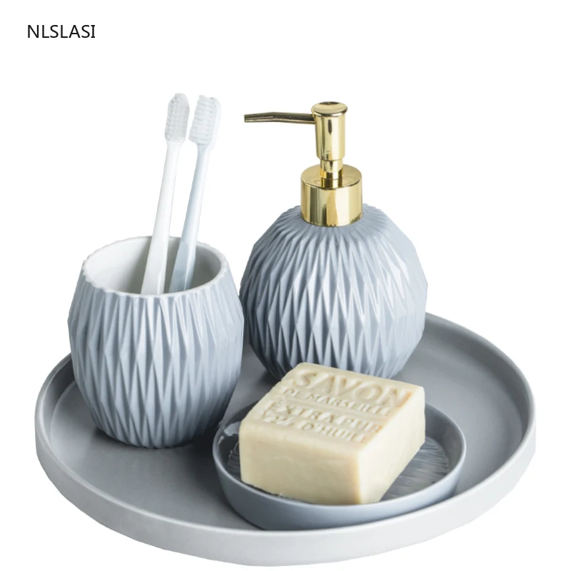 White ceramic bathroom five-piece bathroom wash set combination Nordic creative bathroom supplies set hand soap bottle
White ceramic bathroom five-piece bathroom wash set combination Nordic creative bathroom supplies set hand soap bottle