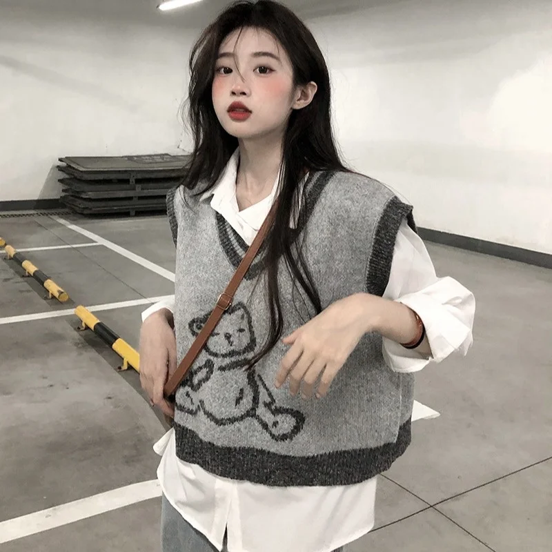 Женский короткий свитер с V-образным вырезом, без рукавов
Женский короткий свитер с V-образным вырезом, без рукавов