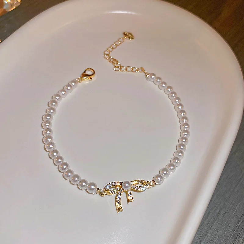 Crystal Rhinestone Bowknot Bracelet Korean Baroque Retro Style Irregular Imitation Pearl Bracelet Women Girls Hand String Jewel
Crystal Rhinestone Bowknot Bracelet Korean Baroque Retro Style Irregular Imitation Pearl Bracelet Women Girls Hand String Jewel