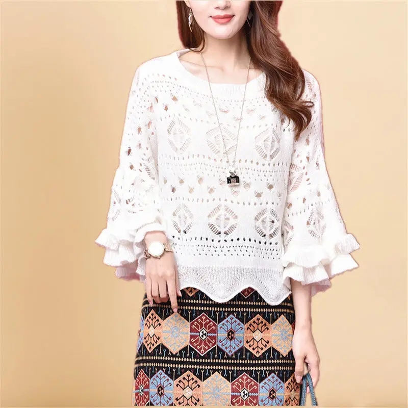 Round collar lotus leaf edge seven-sleeved knitwear women's sleeve small fresh loose short hollow sweet top tide
Round collar lotus leaf edge seven-sleeved knitwear women's sleeve small fresh loose short hollow sweet top tide