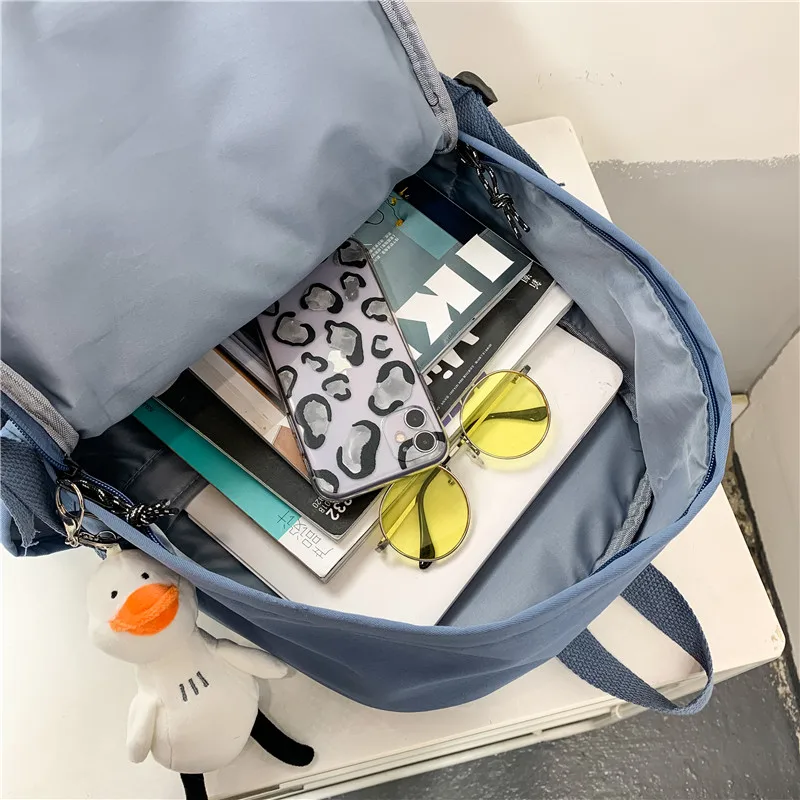 DCIMOR Solid Color Tuck Net Large Capacity Schoolbags For Students Multiple Pockets Waterproof Nylon Couples Backpack Snap Bag
DCIMOR Solid Color Tuck Net Large Capacity Schoolbags For Students Multiple Pockets Waterproof Nylon Couples Backpack Snap Bag