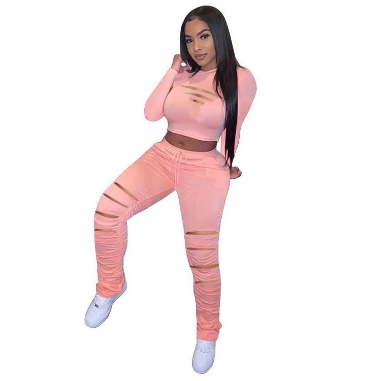 2021 Spring and Autumn Casual Two Piece Set Fashion Soild Color Long Sleeved Hollow Out Top + Cut Out Pants Female Matching Set
2021 Spring and Autumn Casual Two Piece Set Fashion Soild Color Long Sleeved Hollow Out Top + Cut Out Pants Female Matching Set