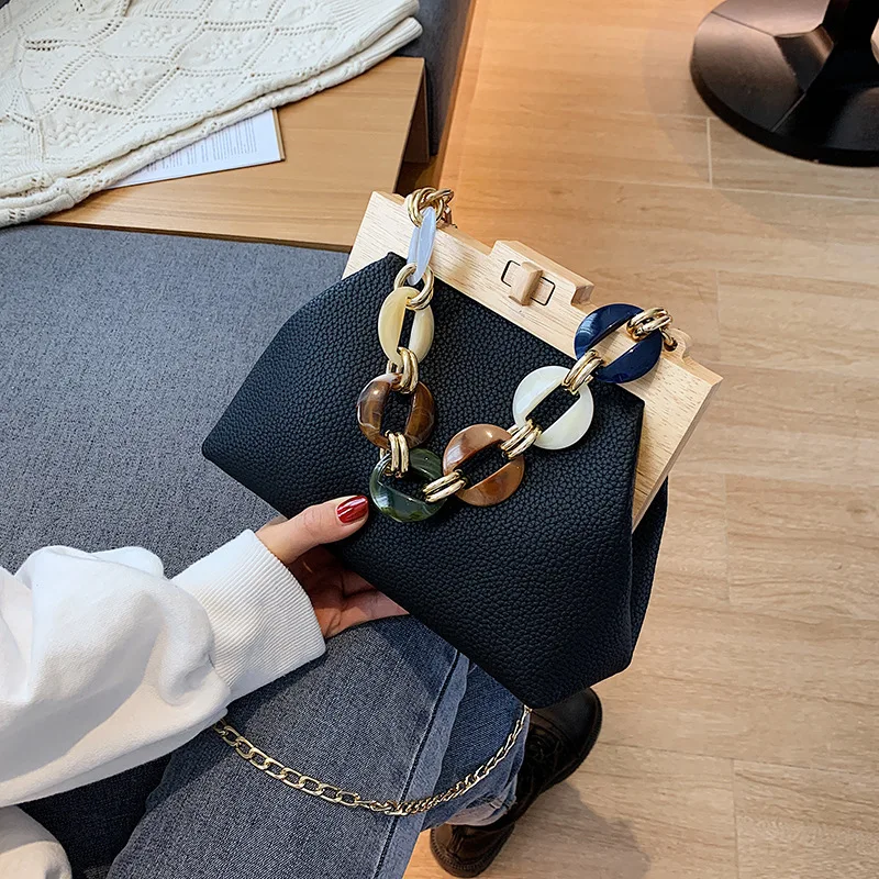 Fashion Wooden Clip Bag Women Shoulder Bag Acrylic Chians Crossbody Bags for Women 2021 High Quality Handbag Kisslock Bags Tote
Fashion Wooden Clip Bag Women Shoulder Bag Acrylic Chians Crossbody Bags for Women 2021 High Quality Handbag Kisslock Bags Tote