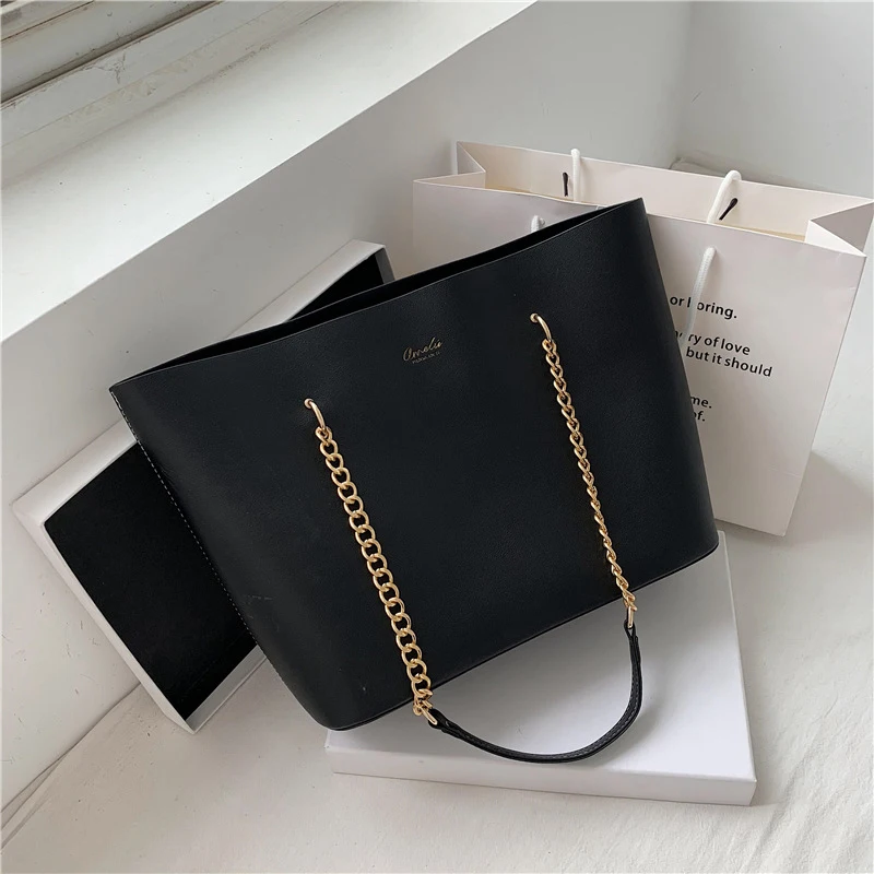 Luxury Brand Designer Handbag Fashion Chain Simple Big Tote Bag High Texture Black PU Leather Handbag Female Summer Shoulder Bag
Luxury Brand Designer Handbag Fashion Chain Simple Big Tote Bag High Texture Black PU Leather Handbag Female Summer Shoulder Bag