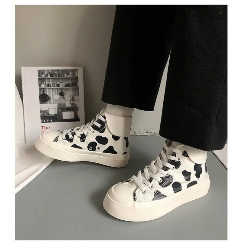 Women' Platform Sports Boots 2021 Spring Summer New Fashion Cow Print Canvas Shoes Female High Top Tennis Casual Flat Sneakers
Women' Platform Sports Boots 2021 Spring Summer New Fashion Cow Print Canvas Shoes Female High Top Tennis Casual Flat Sneakers