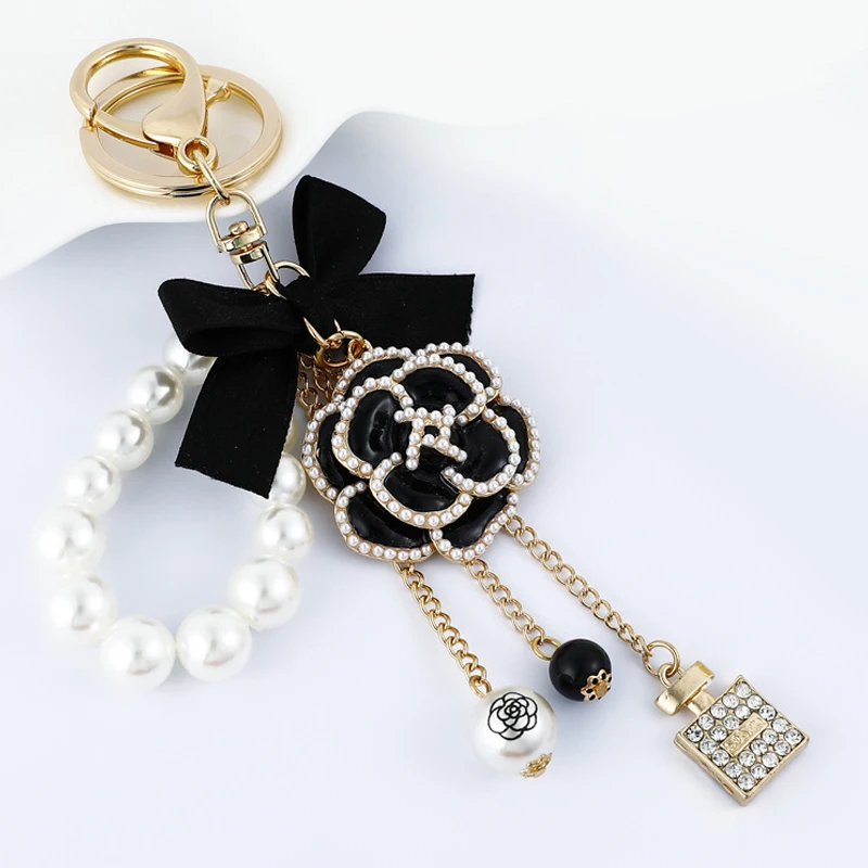 

Bow-Knot Imitation Pearl Perfume Crystal Bottle Iron Tower Chain Keychain Car Key Ring Bag Charm Accessories Girl Keyring Gift