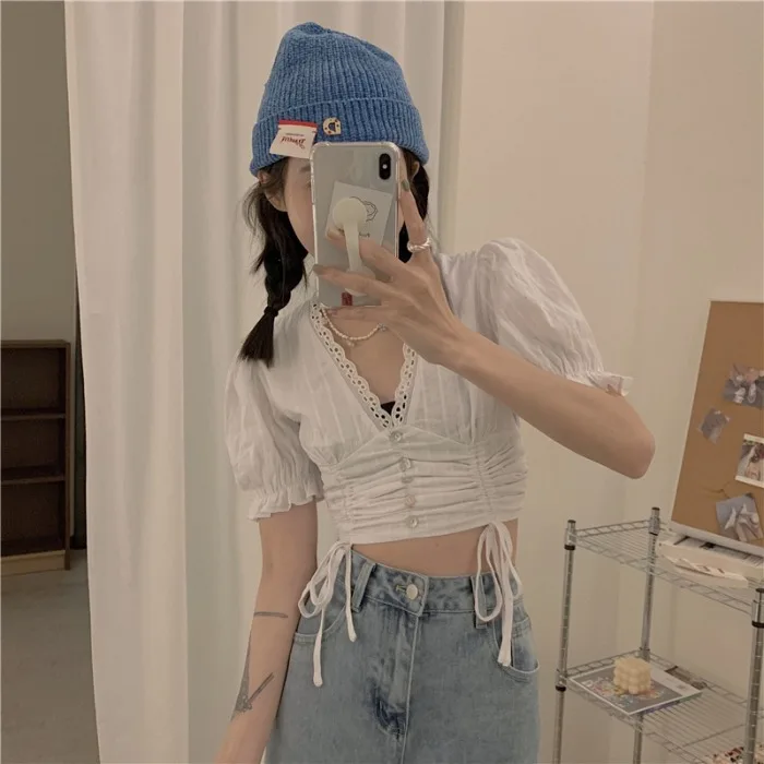 Retro V-neck Puff Sleeve Drawstring Top Women's Summer 2021new Design Sense Niche Hollow-out Short Shirt
Retro V-neck Puff Sleeve Drawstring Top Women's Summer 2021new Design Sense Niche Hollow-out Short Shirt