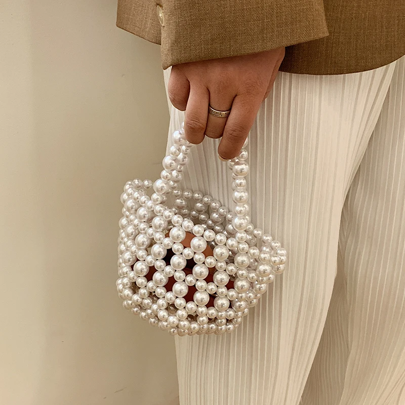 Handmade Beaded Small Pearl Totes Women HandBags 2021 New Summer Ladies Evening Bags Travel Qualited
Handmade Beaded Small Pearl Totes Women HandBags 2021 New Summer Ladies Evening Bags Travel Qualited