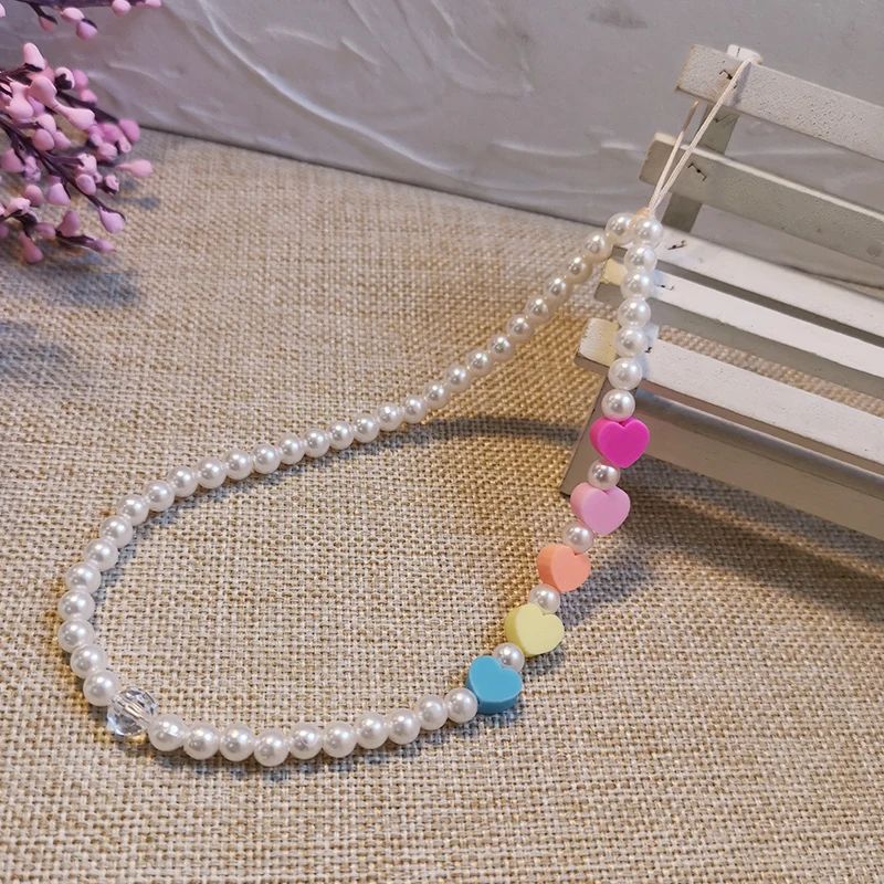 Mobile phone lanyard short wrist pendant net celebrity female love pendant star beads hand-woven strong anti-lost 
Mobile phone lanyard short wrist pendant net celebrity female love pendant star beads hand-woven strong anti-lost