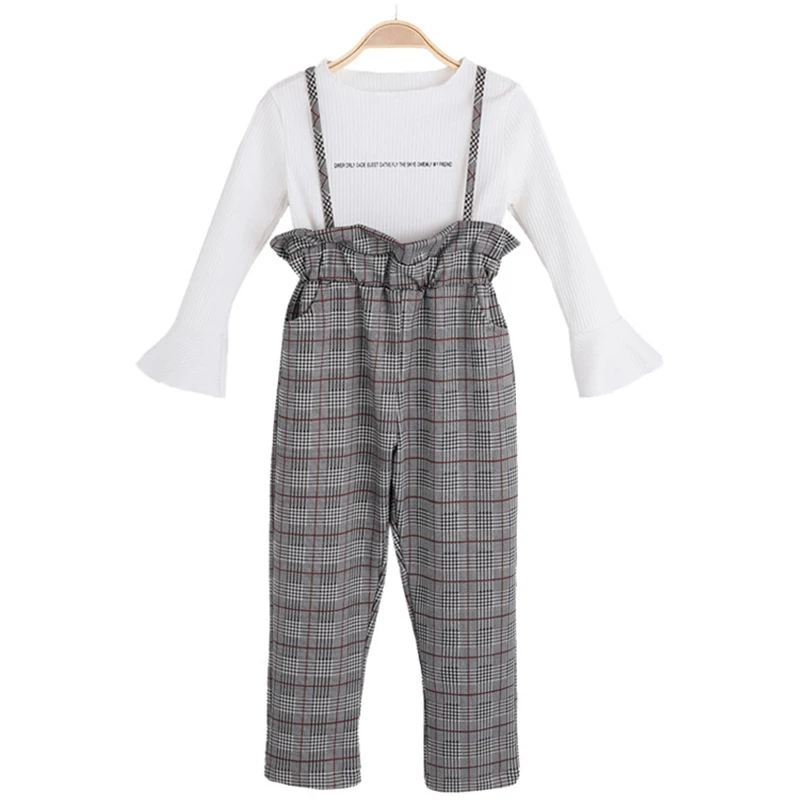 Girls' checked back pants set spring and Autumn New Korean version leisure two piece set children's bottoming shirt + Suspenders
Girls' checked back pants set spring and Autumn New Korean version leisure two piece set children's bottoming shirt + Suspenders