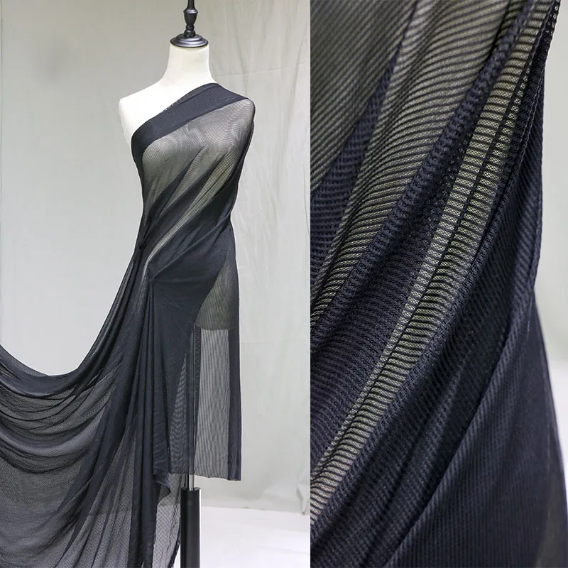 Striped net yarn fabric, black knit bottoming, four-sided stretch soft cotton designer fabric
Striped net yarn fabric, black knit bottoming, four-sided stretch soft cotton designer fabric