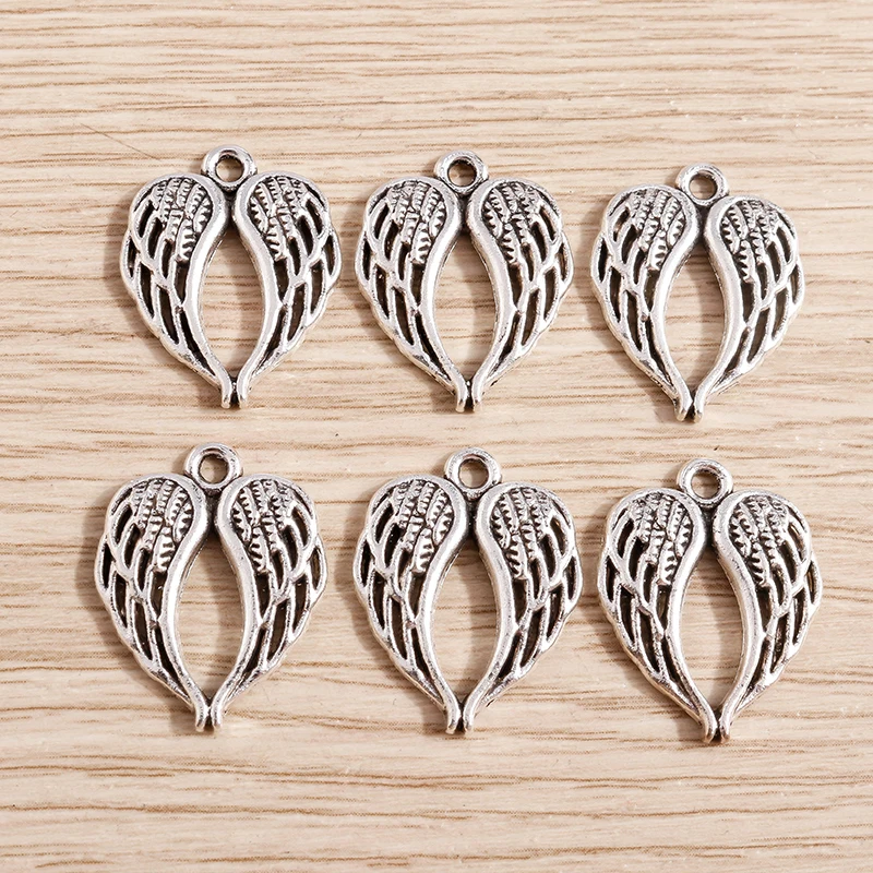 20pcs 17*22mm Vintage Silver Color Hollow Wings Charms Pendants for Jewelry Making DIY Charms Necklaces Earrings Accessories
20pcs 17*22mm Vintage Silver Color Hollow Wings Charms Pendants for Jewelry Making DIY Charms Necklaces Earrings Accessories