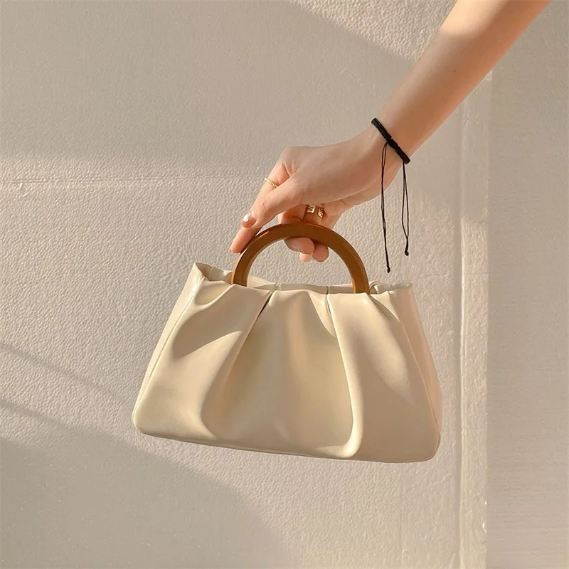Female Crossbody Bag Trapezoidal Vintage Wooden Ring Handle Fold Cloud Small Bag Soft Pu Leather Shoulder Messenger Bags
Female Crossbody Bag Trapezoidal Vintage Wooden Ring Handle Fold Cloud Small Bag Soft Pu Leather Shoulder Messenger Bags