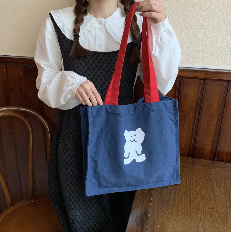 Cute Cartoon Animal Bear Print Women Canvas Tote Bag Simple Blue Bag Red Shoulder Strap Handbag Cotton Shopper Bag For Girl 2021
Cute Cartoon Animal Bear Print Women Canvas Tote Bag Simple Blue Bag Red Shoulder Strap Handbag Cotton Shopper Bag For Girl 2021