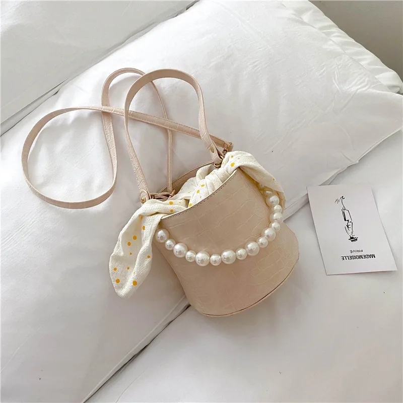 Летняя модная мини сумка-мешок, натуральная однотонная жемчужная сумочка, классическая женская сумка на цепочке, сумка-мессенджер
Летняя модная мини сумка-мешок, натуральная однотонная жемчужная сумочка, классическая женская сумка на цепочке, сумка-мессенджер