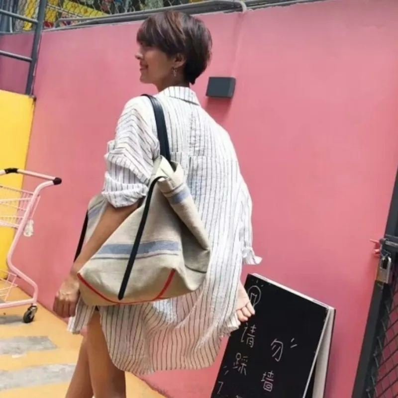 Women Big Capacity Canvas Tote Bag Casual Shopping Packing Handbag Beach Bag Bucket Style Street Sac a Main Design Shoulder Bags
Women Big Capacity Canvas Tote Bag Casual Shopping Packing Handbag Beach Bag Bucket Style Street Sac a Main Design Shoulder Bags