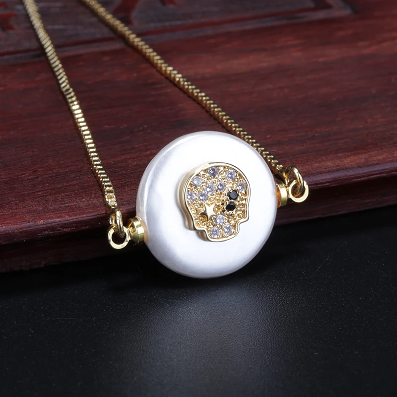 5pcs/lot mix cz micro paved gold skull charm on flat pearl shell connector beads thin link bracelets for woman
5pcs/lot mix cz micro paved gold skull charm on flat pearl shell connector beads thin link bracelets for woman