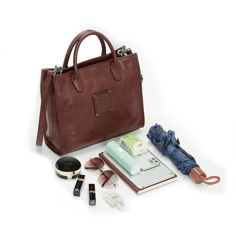 Large-capacity handbag 2021 new simple fashion retro female bag handmade first layer bag messenger bag lady tote bag leather
Large-capacity handbag 2021 new simple fashion retro female bag handmade first layer bag messenger bag lady tote bag leather