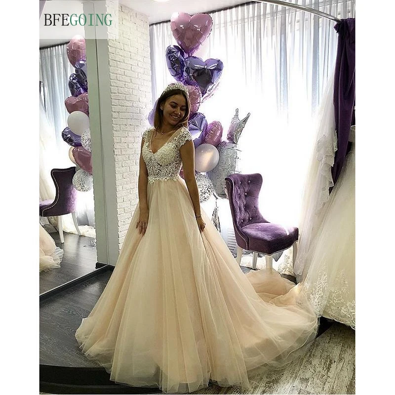 Champagne Tulle Lace V-Neck Bridal gown Floor-Length A-line Wedding dress Chapel Train Custom made 
Champagne Tulle Lace V-Neck Bridal gown Floor-Length A-line Wedding dress Chapel Train Custom made
