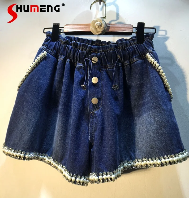 Новинка Осень-зима 2021 изысканные европейские джинсовые шорты Стразы с бусинами и высокой талией женские стройнящие короткие джинсы с широк...
Новинка Осень-зима 2021 изысканные европейские джинсовые шорты Стразы с бусинами и высокой талией женские стройнящие короткие джинсы с широк...